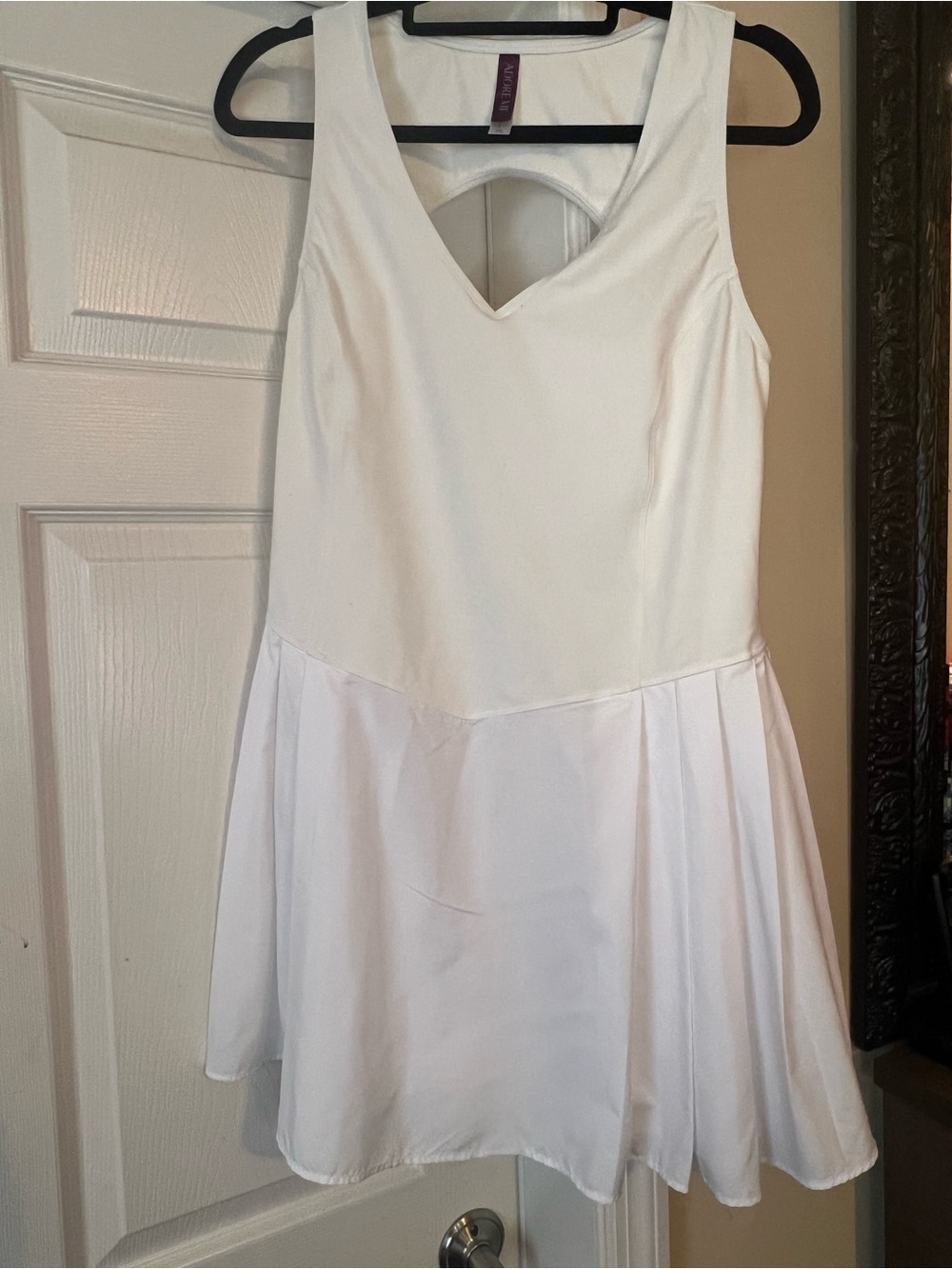 Adore Me White Sleeveless Athletic Dress with V Neck and Open in Black